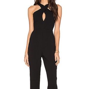 BCBG black Crisis cross top skinny leg jumpsuit.